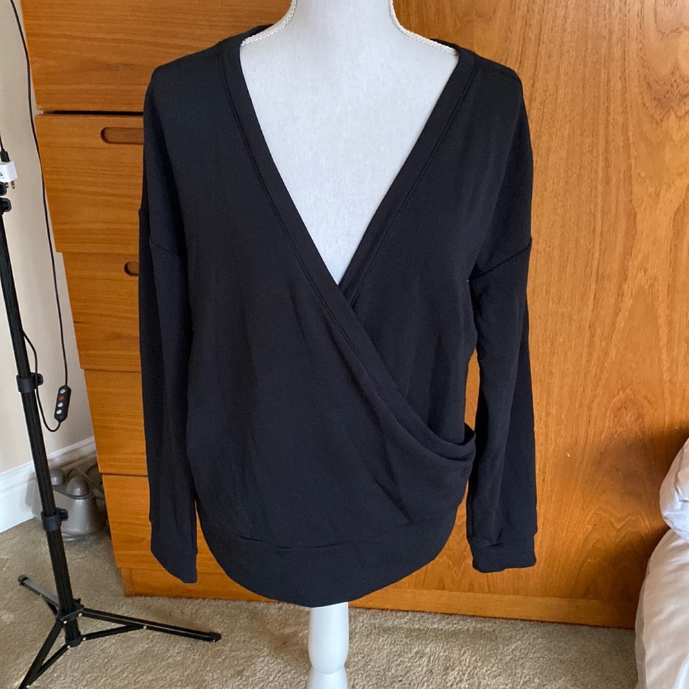 NWOT Zella brand pullover black crisscross sweatshirt with deep V. Size M